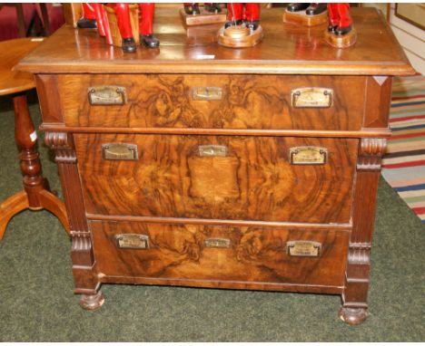 A 19th Century walnut Dutch provincial commode chest 
