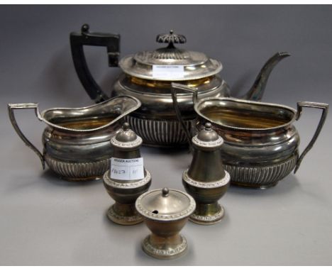 A silver-plated three piece tea service, together with a three piece silver-plated cruet