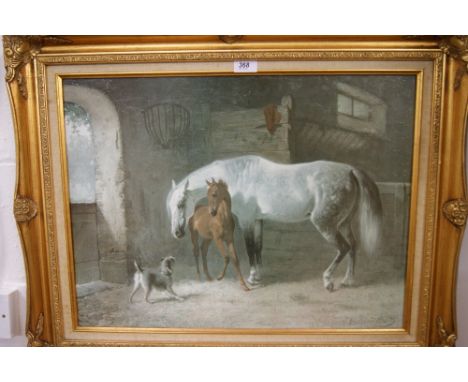 A large decorative gilt framed print