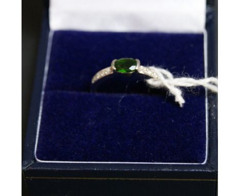 9 ct white gold, emerald and diamond ring. 