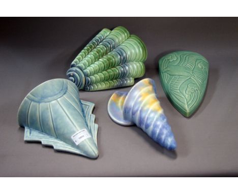 A selection of four Art Deco ceramic wall pockets