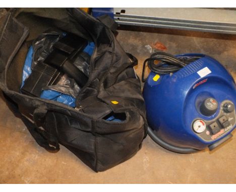 A POLTI STEAM CLEANER PLUS BAG OF TOOLS
