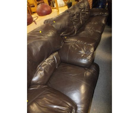 A LEATHER THREE SEATER SOFA AND ARMCHAIR