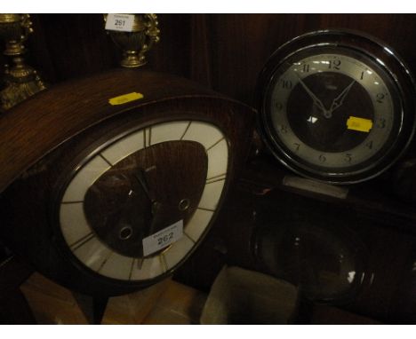 A RETRO OAK SMITHS MANTEL CLOCK TOGETHER WITH A METAMEC EXAMPLE 