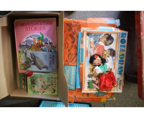 A SELECTION OF VINTAGE BOARD GAMES TO INCLUDE A MINIC MOTORWAYS EXAMPLE, PELHAM PUPPET ETC