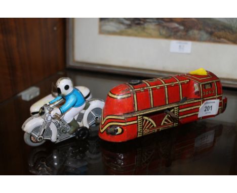 A VINTAGE WINDUP TIN PLATE TRAIN TOY TOGETHER WITH WINDUP MOTORBIKE &amp; CYCLE TOY 