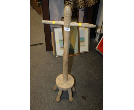 A VINTAGE WOODEN WASHING DOLLY