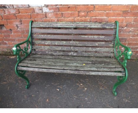 A GARDEN BENCH WITH CAST LEGS