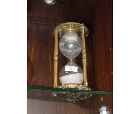 A VINTAGE BRASS HOUR GLASS 