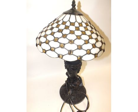 A FIGURATIVE TIFFANY STYLE LAMP 