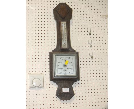 AN ART DECO OAK BAROMETER 