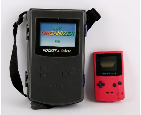 Nintendo Game Boy Colour [Berry] system (PAL) inside of a Logic3 'My Organizer' carry case Item is in good condition 