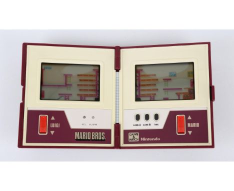 Nintendo Game & Watch Mario Bros [MW-56] handheld console Console is unboxed and untested Condition Report:  There is notable