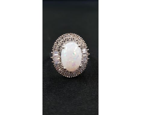 LARGE OPAL AND CRYSTAL DRESS RING