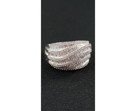 WHITE GOLD AND DIAMOND TWIST STYLE RING