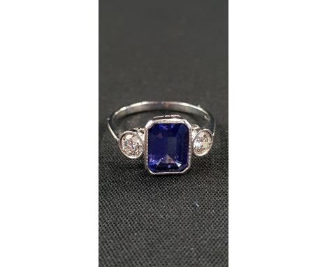 PLATINUM SET 3 STONE TANZANITE (2.85 CARATS) AND DIAMOND (0.6 CARAT) RING