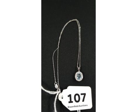 18CT GOLD, DIAMOND AND AQUA MARINE PENDANT ON 18CT GOLD CHAIN