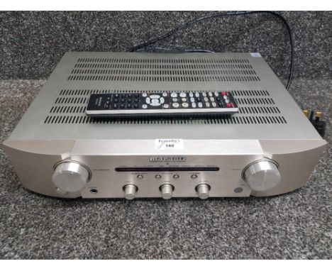 A Marantz Integrated Amplifier PM6006, with remote.