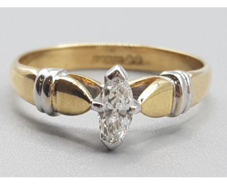 Ladies 18ct yellow gold diamond ring, comprising of a marque cut diamond set in a white gold claw setting, 4.1g gross, size R