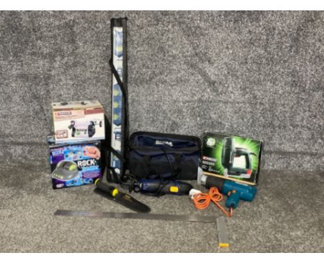 Box of various tools including grinder, level and straight edge