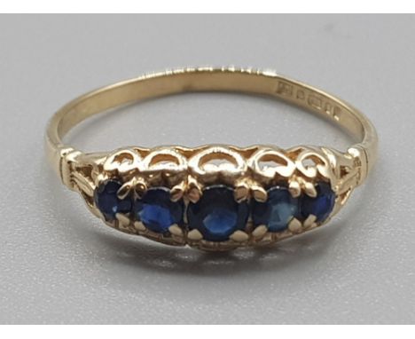 Ladies 9ct yellow gold 5 stone sapphire ring, comprising of 5 round blue sapphires, 1.3g gross, size M