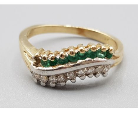 Ladies 14ct yellow gold emerald &amp; diamond ring, featuring 9 round cut emerald and 9 round brilliant cut diamonds, 2.5g, s