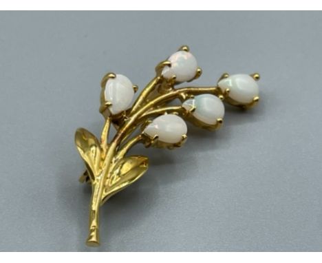 Opal stone floral brooch