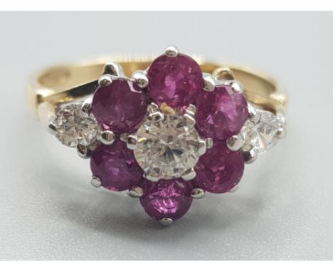 Ladies 9ct ruby &amp; white stone cluster ring, comprising of 6x rubys and 3 cubic zirconias, 3.1g gross, size N