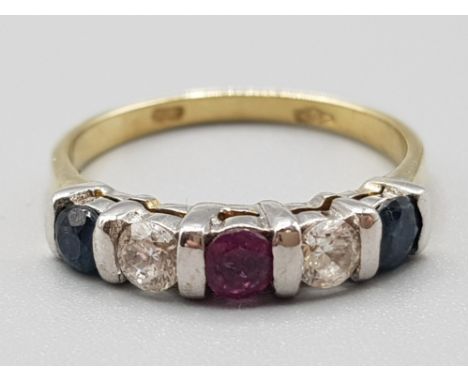 Ladies 9ct yellow gold stone set ring, featuring 2x blue sapphires, 2x cubic zirconias &amp; 1x red stone set in the centre, 