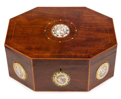 A George III mahogany octagonal sewing box, the hinged cover set with an oval ivory miniature painted with a lady resting on 