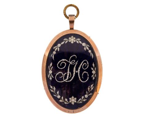 An 18th century gold framed oval mourning pendant, the engine turned blue enamel set with seed pearl initials and flowers, th