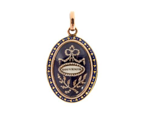 An 18th century gold, enamel and seed pearl oval memorial or mourning pedant, inscribed 'SOUVENIR', blue guilloche enamel wit