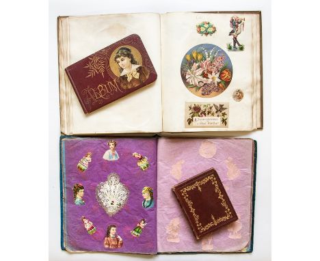 Two mid-Victorian scrapbooks (c.1870s), one bound in vellum with 'Crests' inscribed to upper board (the opening three pages a