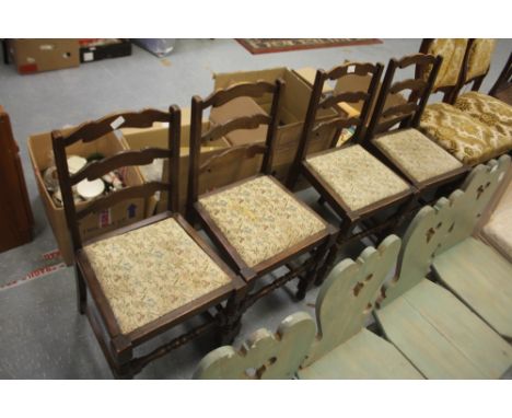 Four ladder back chairs