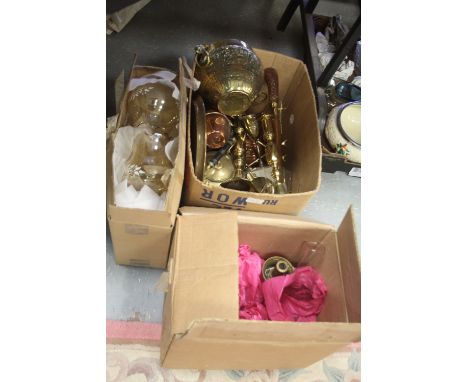 Two boxes of brass and copper wares, including ejector candlestick, lamps, etc.