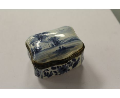 19th Century Dutch Delft pottery serpentine trinket box, with factory mark O/A to base (mount glued)