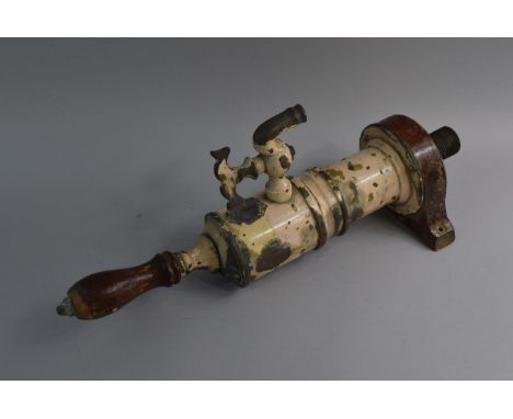 A Vintage Painted Brass Beer Pump with Tap and Turned Wooden Handle. 47cms High 