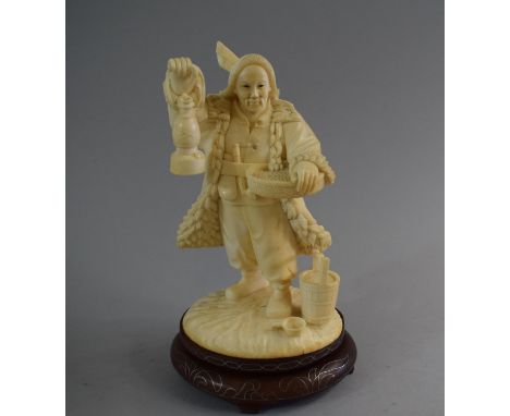 A Carved Chinese Ivory Figure in the Form of Standing Farmer Holding Lantern and Basket. Set on Silver Wire Inlaid Oval Base.