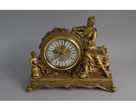 A Modern Rhythm Resin Mantle Clock with Figural Decoration set on Rectangular Scrolled Base. 28cm High