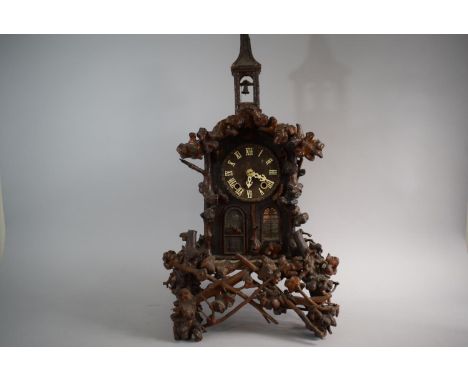 An Unusual 19th Century Black Forest Mantle Clock in the Form of a Chapel with Automaton Monk Appearing Through Door to Ring 