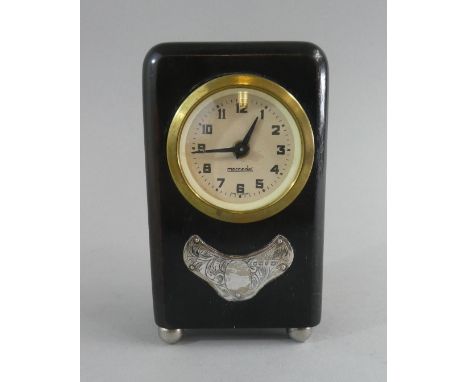 An Edwardian Ebonised Mantle Clock by Mercedes with Silver Mount, London 1924. Working 14cm high 