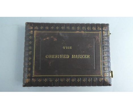 An Edwardian Tooled Leather Cased Hinged Cribbage, Bezique and Whist Marker, "The Combined Marker" with Seven Pegs 