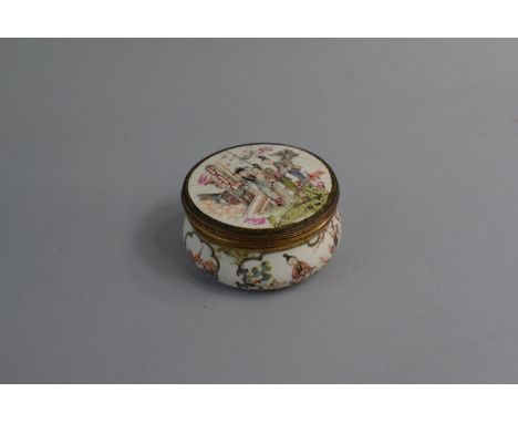 An Enamelled Circular Lidded Box decorated with Figures in Garden and Interior Scenes. (Repair to Lid and General Rubbing to 