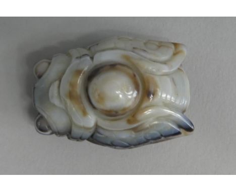 An Attractive Banded Hardstone Netsuke Modelled as a Cicada with Character Type Marks Under. 3.5x4.5cms Long