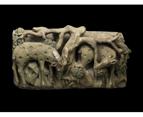 Yuan Dynasty, 1271-1368 AD. A substantial ceramic tile with frieze of deer in a thicket with flowers modelled in high relief;