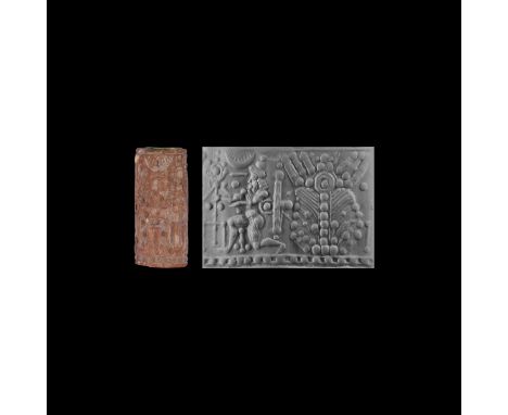 10th-late 7th century BC. A carved jasper Neo-Assyrian cylinder seal with La?mu before the Marduk-symbol; facing left the god