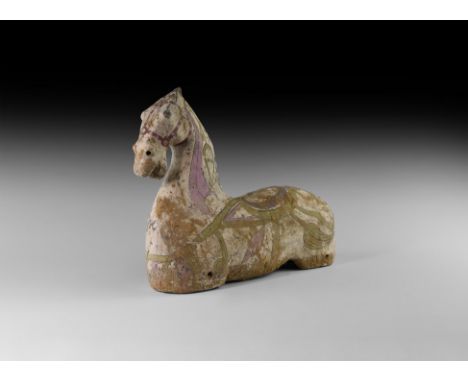 Han Dynasty, 206 BC-220 AD. A ceramic figure of a horse with painted bands of tulip and other floral ornament, sockets to the