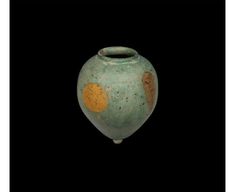 13th century AD. A piriform fritware vessel with knop finial, raised rim, applied disc of orange pigment and teardrop panels 