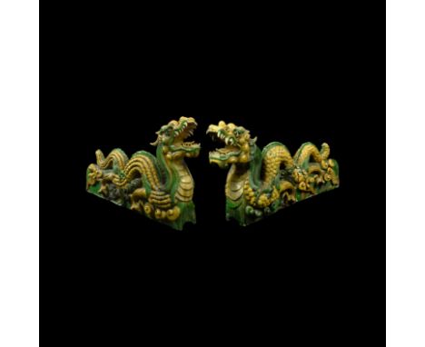 Ming Dynasty, 1368-1644 AD. A very large and spectacular pair of glazed ceramic dragon (long) ridge-tiles from a roof, each i