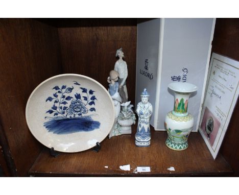 SECTION 34. Two Lladro porcelain figures, one with original box, and three pieces of Oriental porcelain.